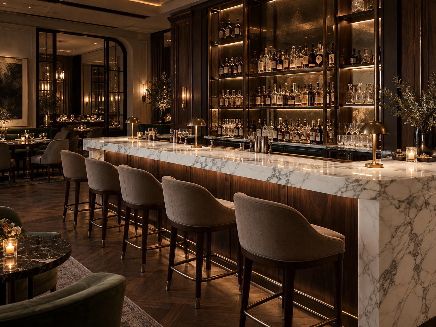 White Italian marble paired with dark walnut in a luxury bar interior